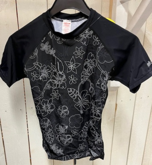 Dakien Rashguard Woman Svart/Blommor Medium (Restparti)